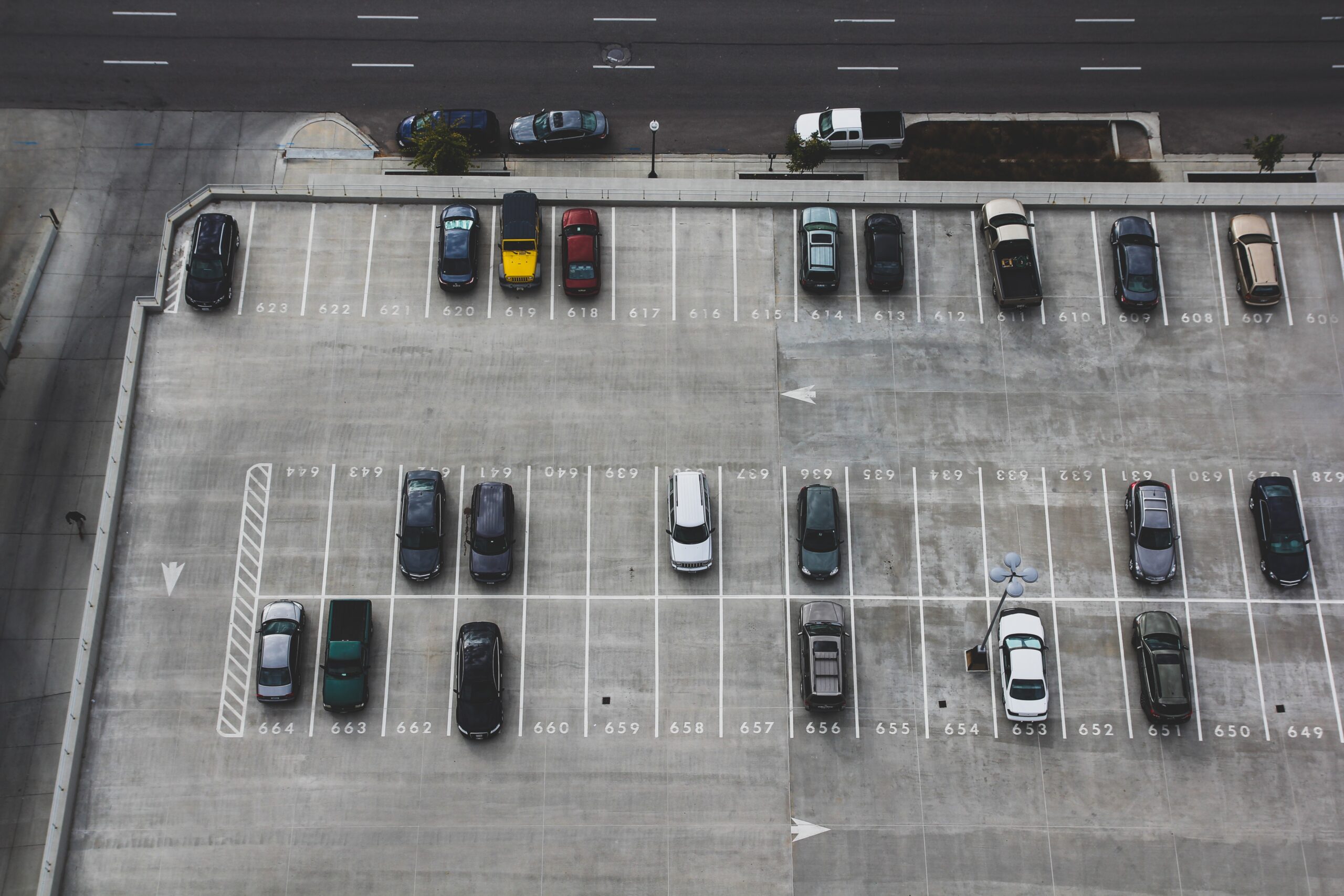 an aerial photograph of a parking lot