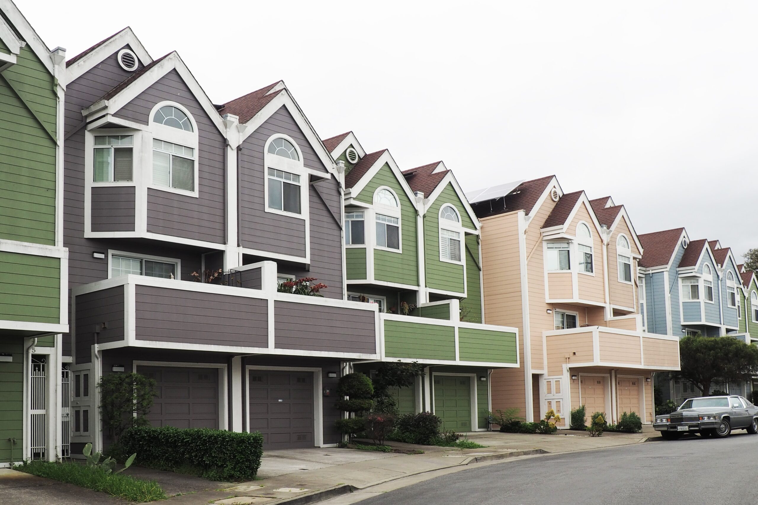 Line of houses during day by Marcus Lenk