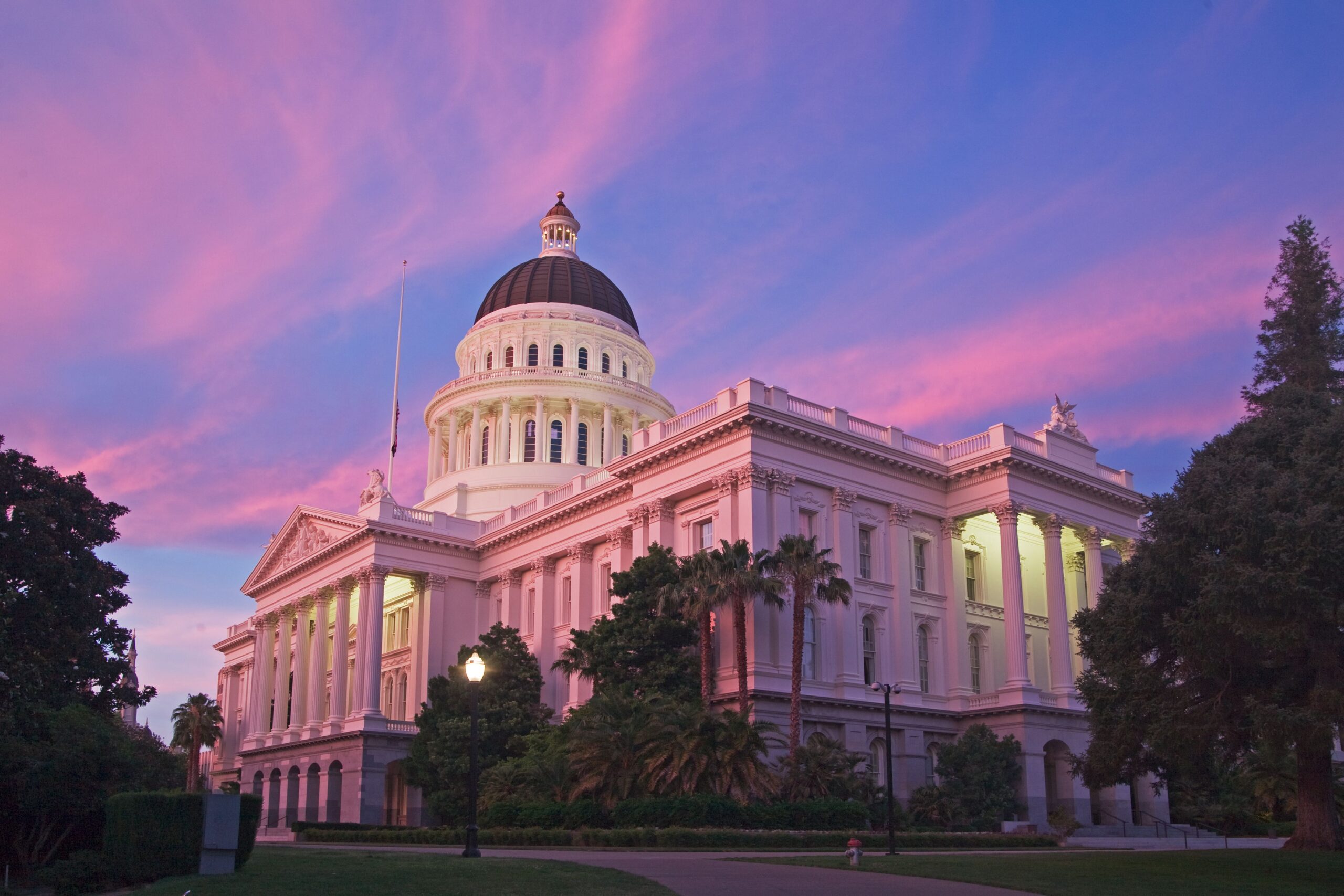 Capitol in Sacramento with sunset colors of purple and blue